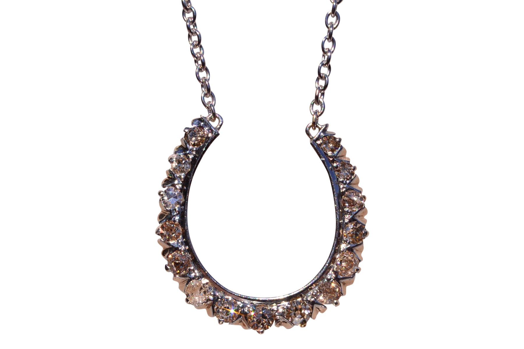 SOLD - The Jument: Antique Platinum Topped Horseshoe Pendant set with Old Cut Diamonds