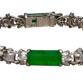 The Pulsera:  Outstanding Signed Imperial Fei Cui Jadeite A Jade Bracelet set with Diamonds