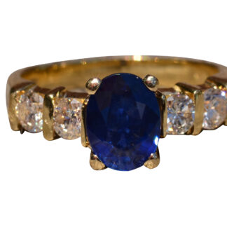 SOLD - The Zafiro: 14 Karat Yellow Gold Sapphire Engagement Ring set with Diamonds