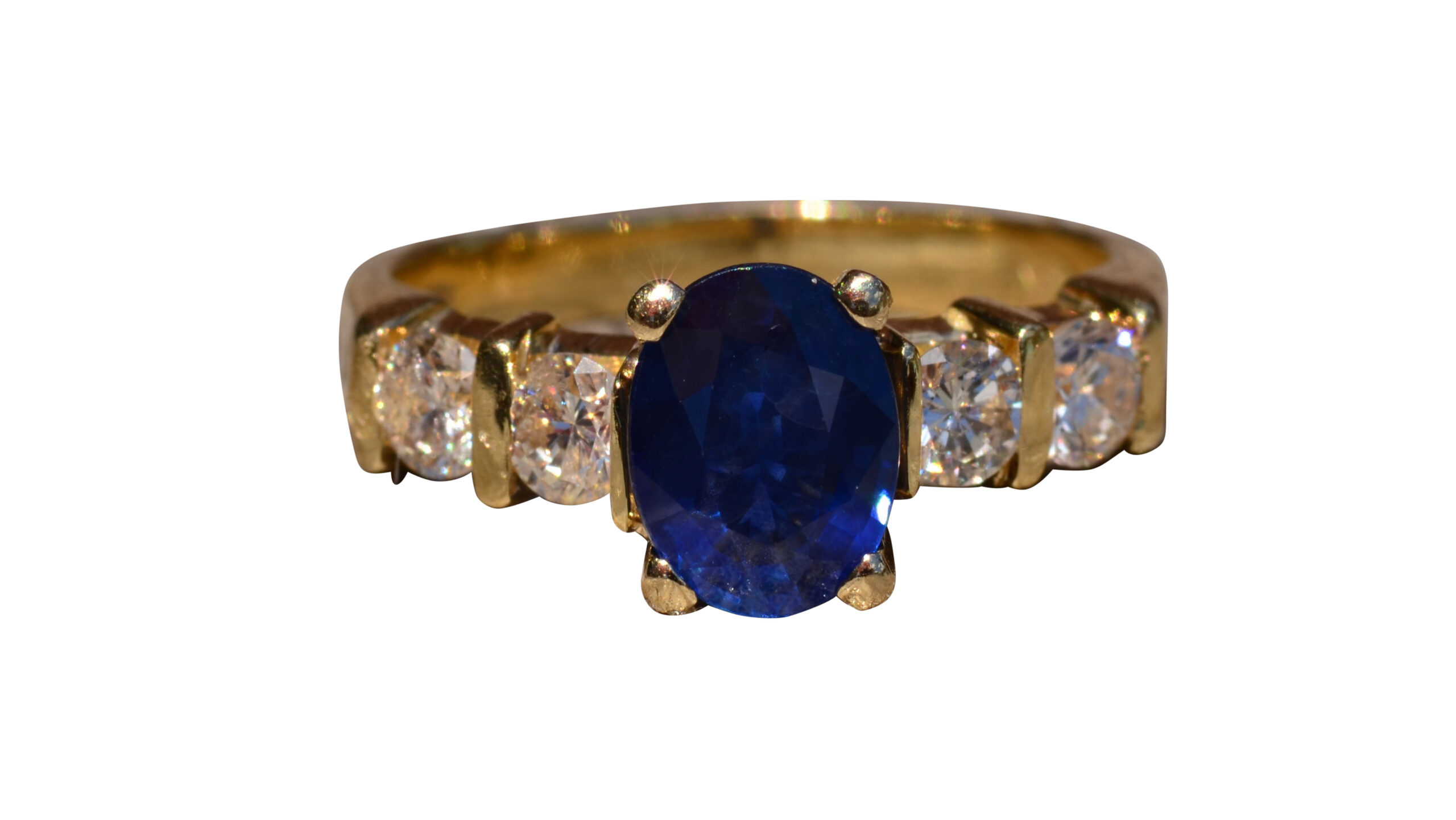 SOLD - The Zafiro: 14 Karat Yellow Gold Sapphire Engagement Ring set with Diamonds