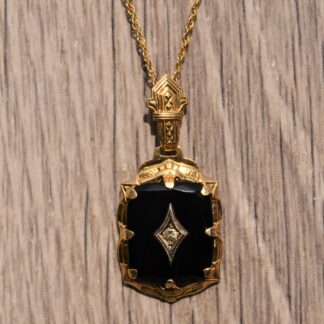 SOLD - The Collier: Antique Yellow Gold Pendant set with Black Onyx and Diamond