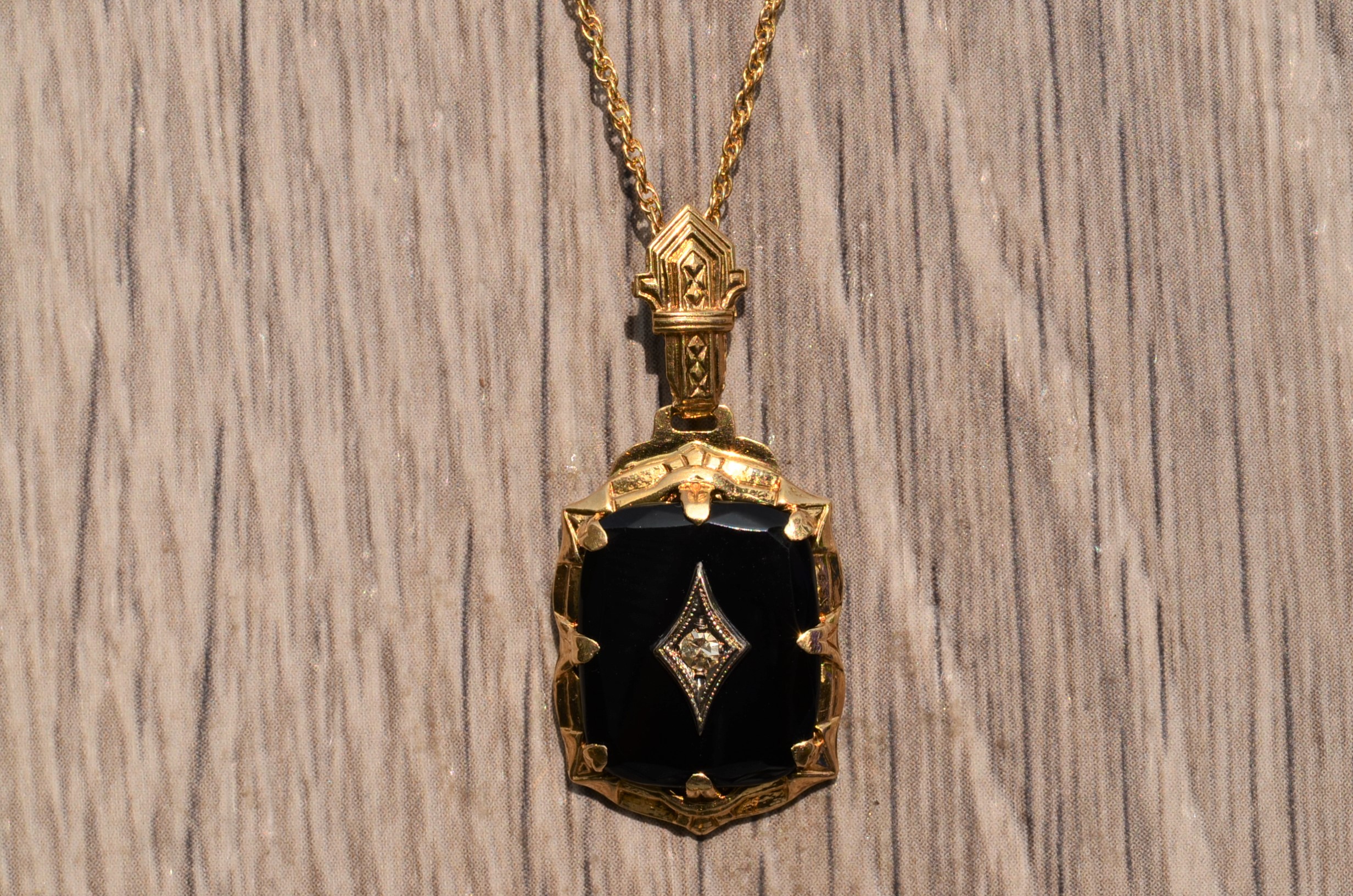 SOLD - The Collier: Antique Yellow Gold Pendant set with Black Onyx and Diamond