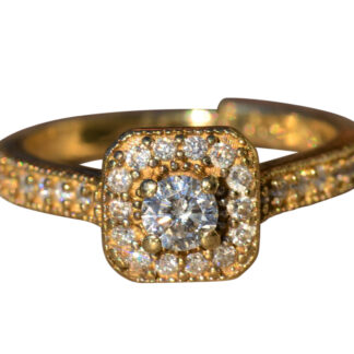 The Strummer:  Ladies 10 K Gold Diamond Halo Engagement Ring