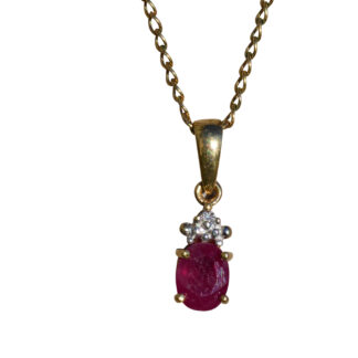 SOLD - Ladies Simple 14K Gold Pendant set with Ruby and Accent Diamond