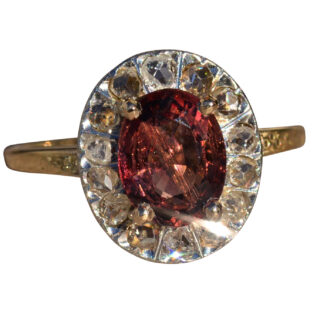 The Ralita:  Antique Two Tone Oval Tourmaline and Rose Cut Diamond Halo Ring