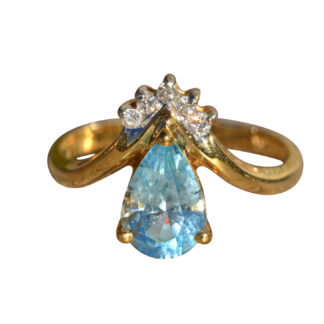 Th Cerulean:  Teardrop Topaz and Diamond Ring in 14 K Gold