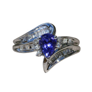 The Artemisia:  Ladies Bypass Style White Gold Ring set with 0.75 CT Tanzanite and Side Diamonds