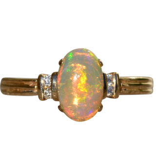 The Seacoasts:  Ladies Vintage 14K Gold Ring set with 1.25 CT Opal and Diamonds