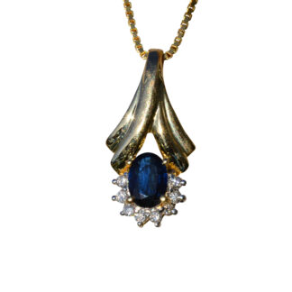 Ladies 14K Yellow Gold Pendant set with 1 CT Sapphire and 0.16 CTW Diamonds