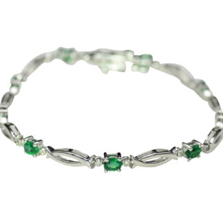 The Slana:  Ladies Contemporary Emerald and Diamond Bracelet in 14K Gold