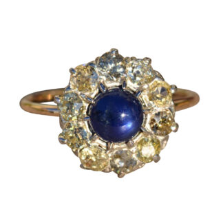 The Tana:  Antique Mixed Metal Sapphire Cabochon and Old Mine Cut Diamond Halo Ring