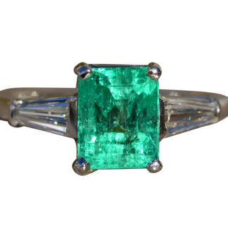 The Beyla:  Antique Ladies Platinum Ring set with Outstanding Colombian Emerald and Tapered Baguette Diamonds