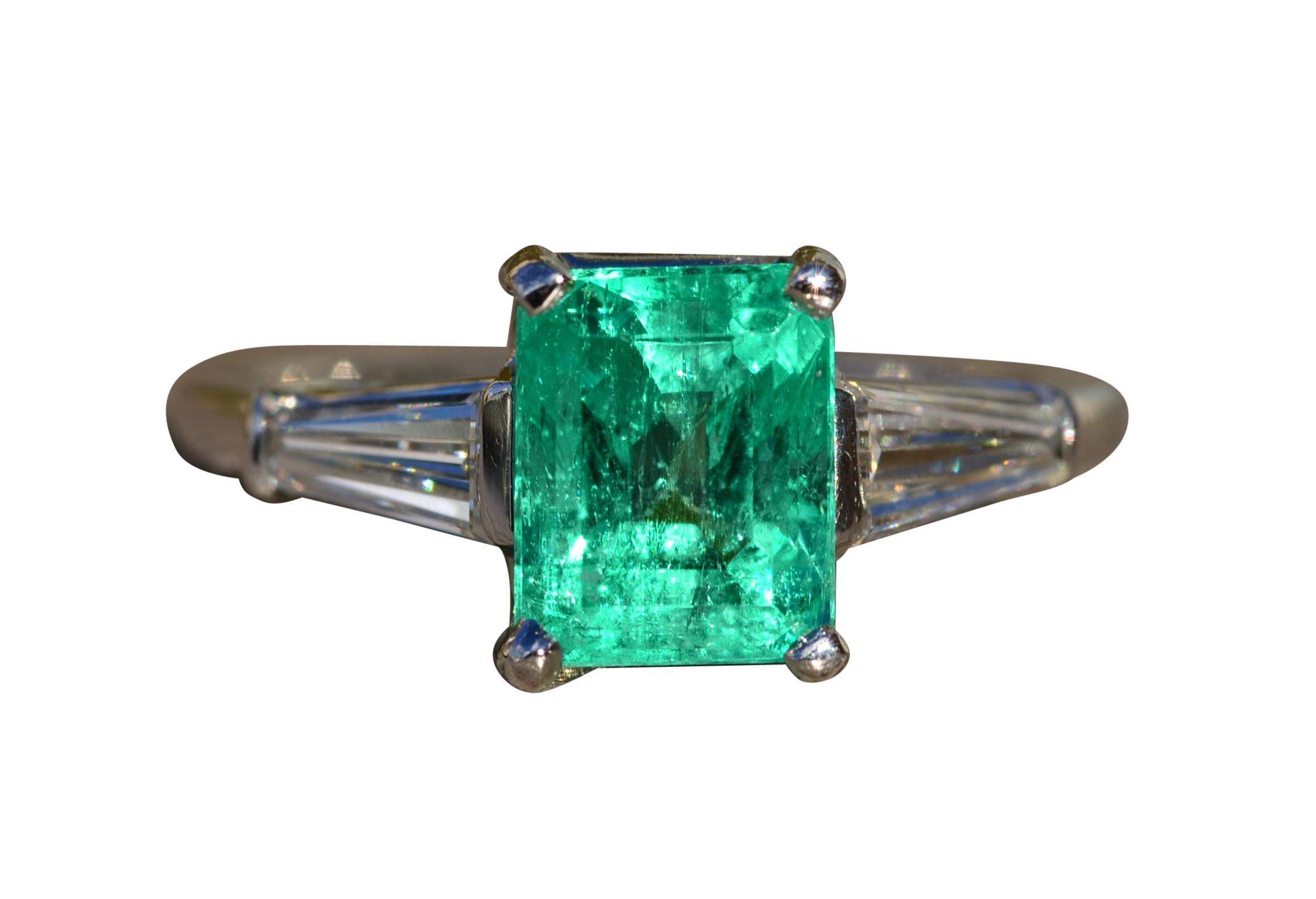 The Beyla: Antique Ladies Platinum Ring set with Outstanding Colombian Emerald and Tapered Baguette Diamonds