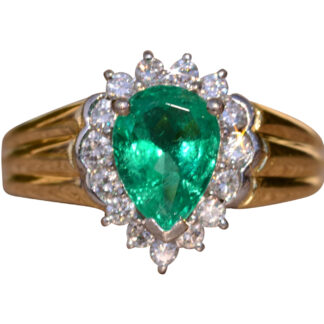 SOLD - The Muso:  Vintage Ring set with 1.25 Carat Vivid Green Natural Emerald with Diamond Halo