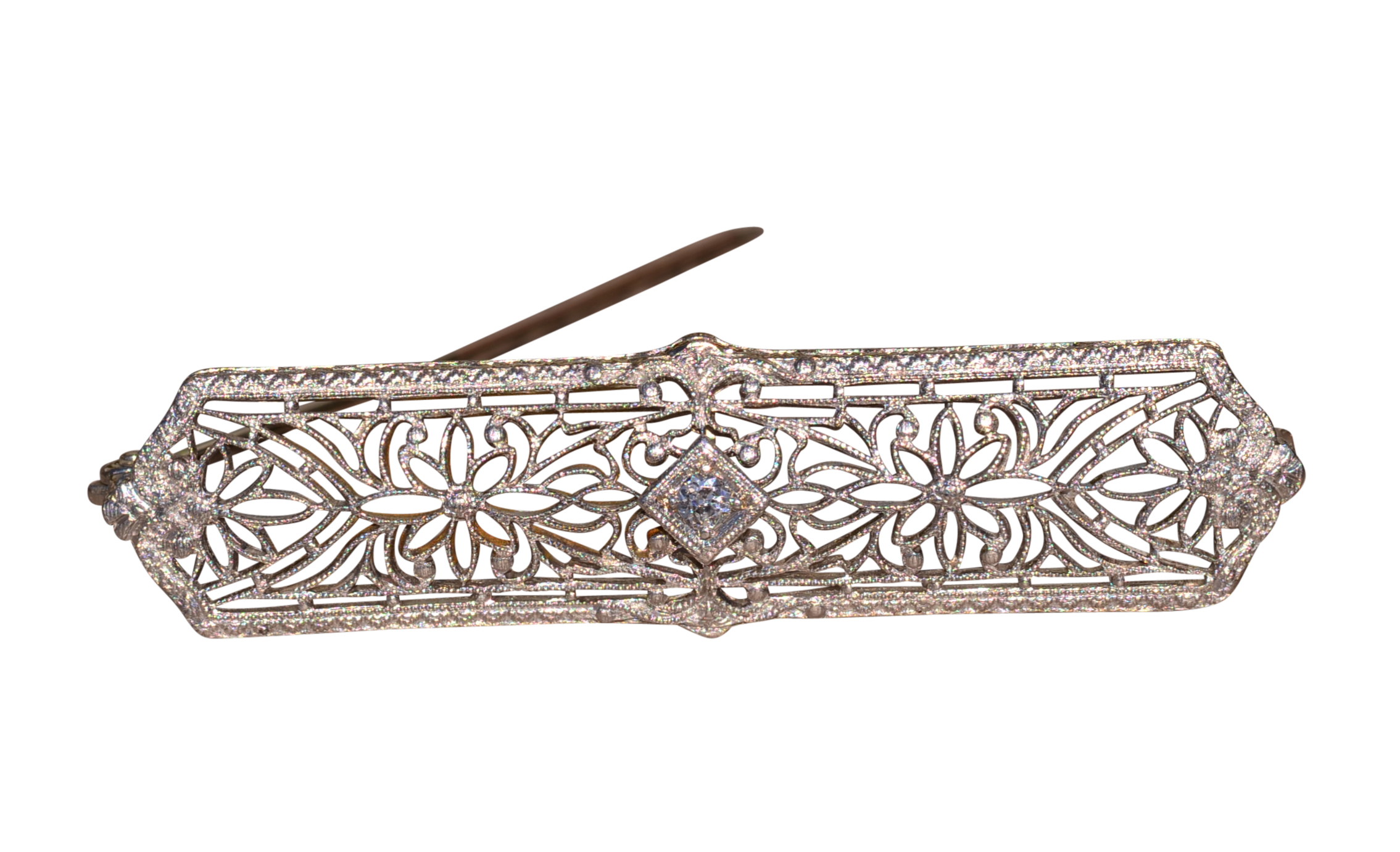 The Fedor: Antique Filigree Brooch in White Gold with an Old Mine Cut Diamond