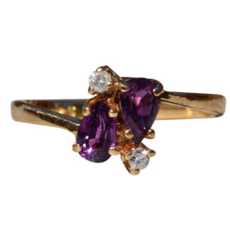 The Worral:  Ladies 14K Sapphire and Diamond Bypass Ring