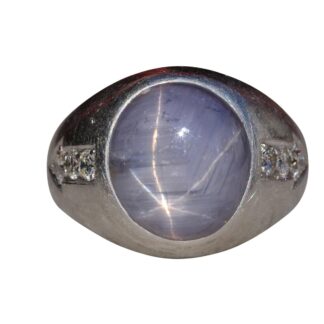 The Gooma: Art Deco Era Star Sapphire Ring with Diamonds in Platinum