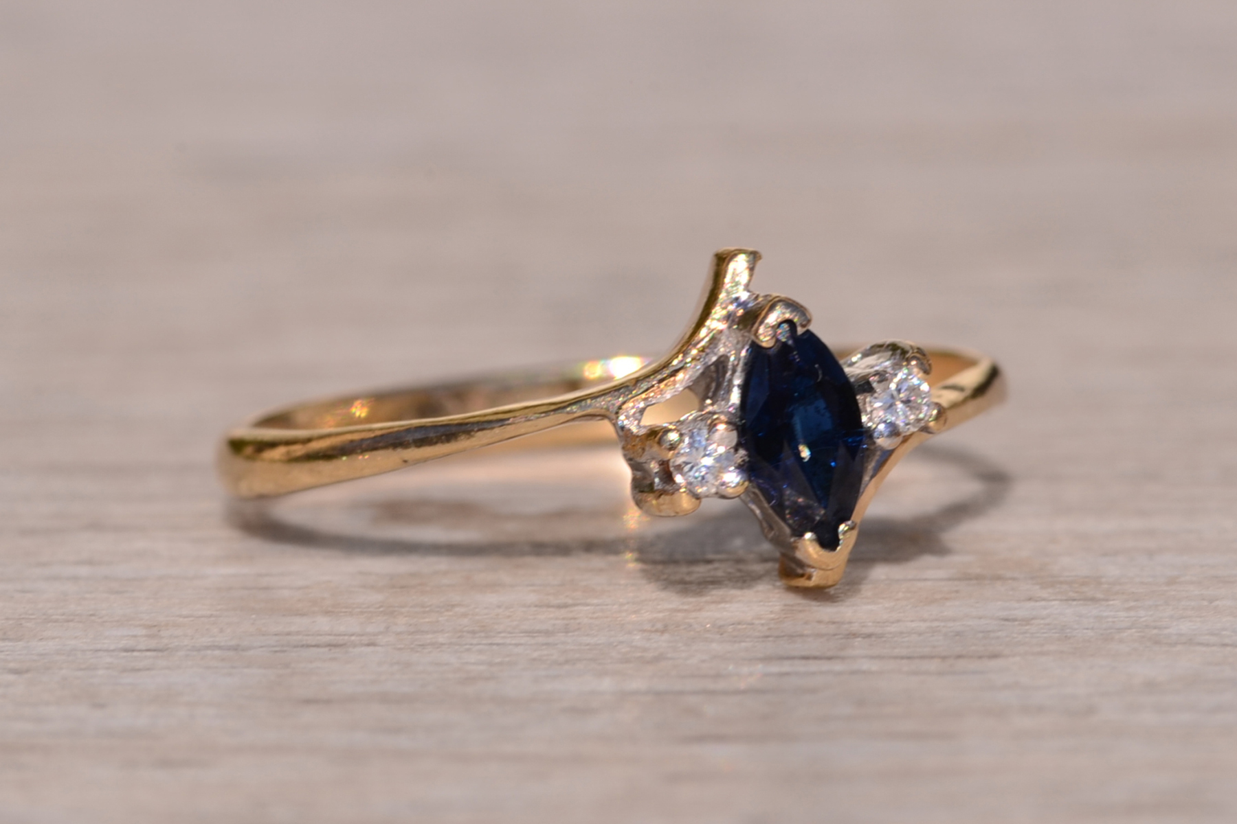 SOLD - The Town Creek: Vintage Yellow Gold Marquise Sapphire and Diamond Bypass Ring - Image 6