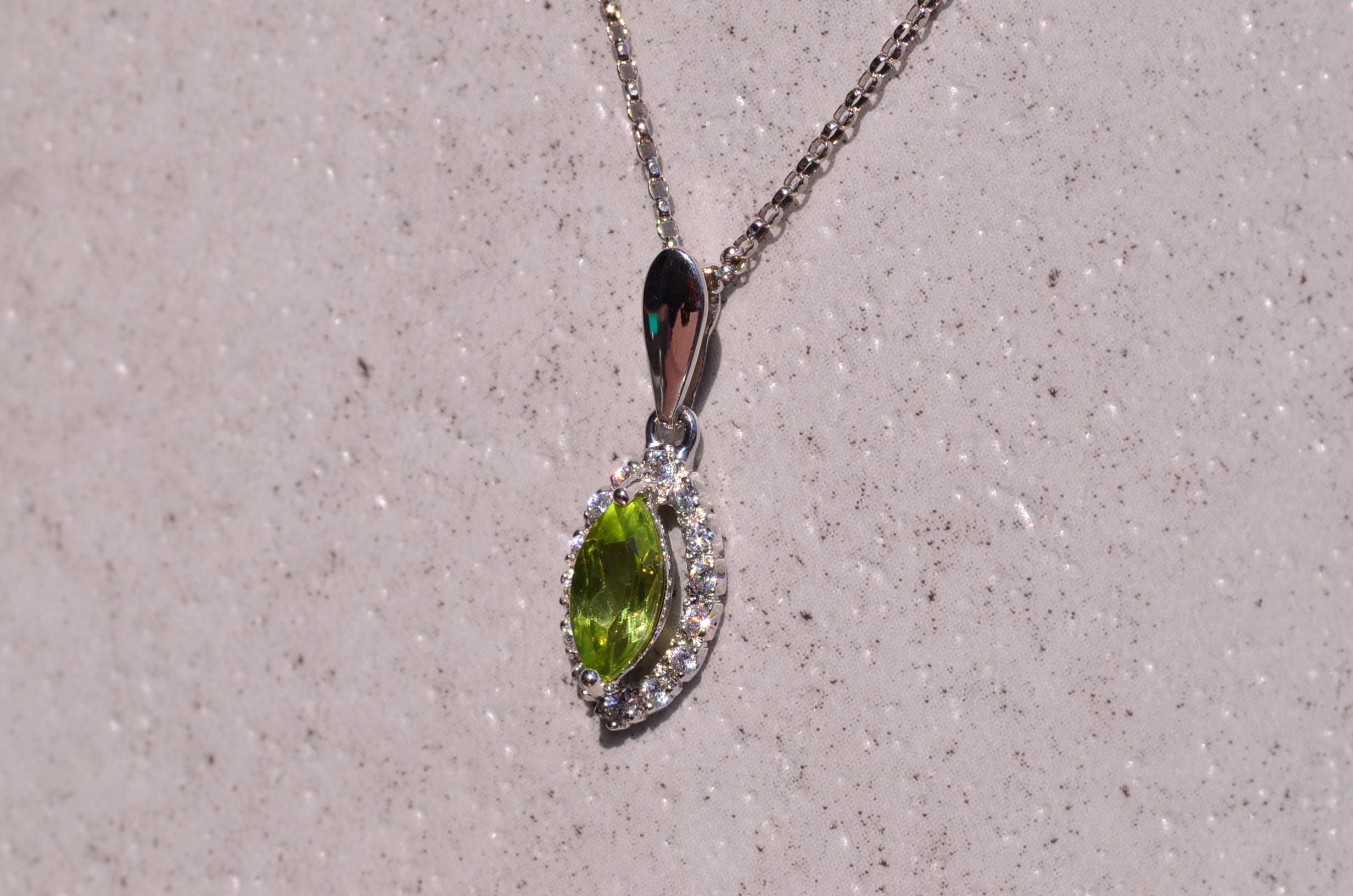 The Eze: Marquise Peridot and Diamond Halo Necklace in White Gold - Image 2