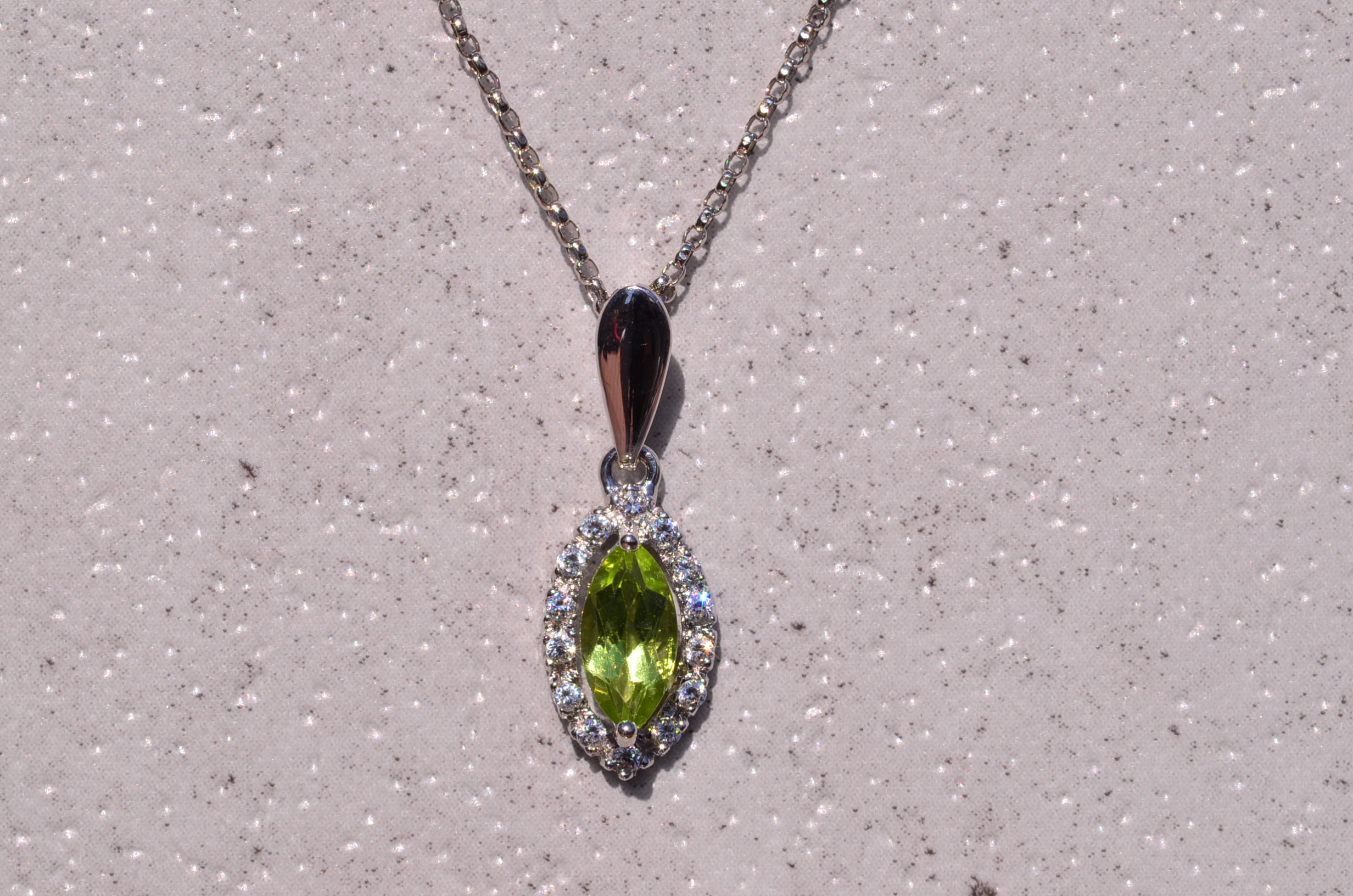 The Eze: Marquise Peridot and Diamond Halo Necklace in White Gold - Image 3