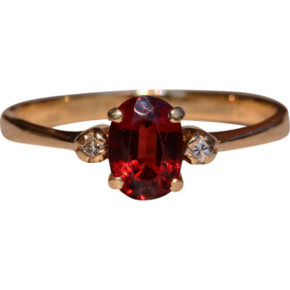 The Caswell:  Garnet and Diamond Three Stone Ring In Yellow Gold