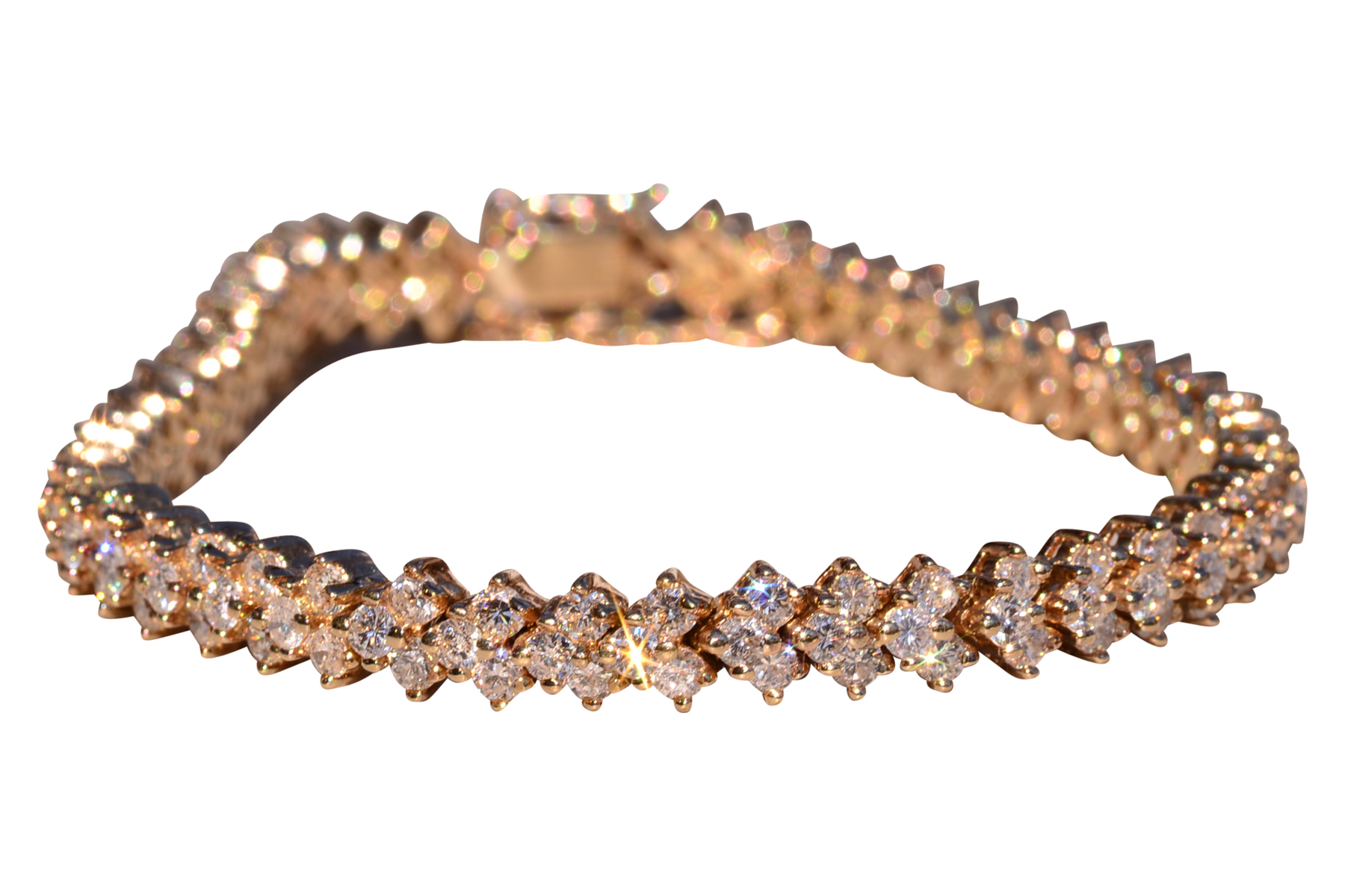 The 15th Street: Triple Row Natural Diamond Bracelet in Yellow Gold