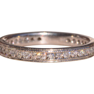 The 70th Street:  White Gold Channel Set Eternity Band with Natural Diamonds