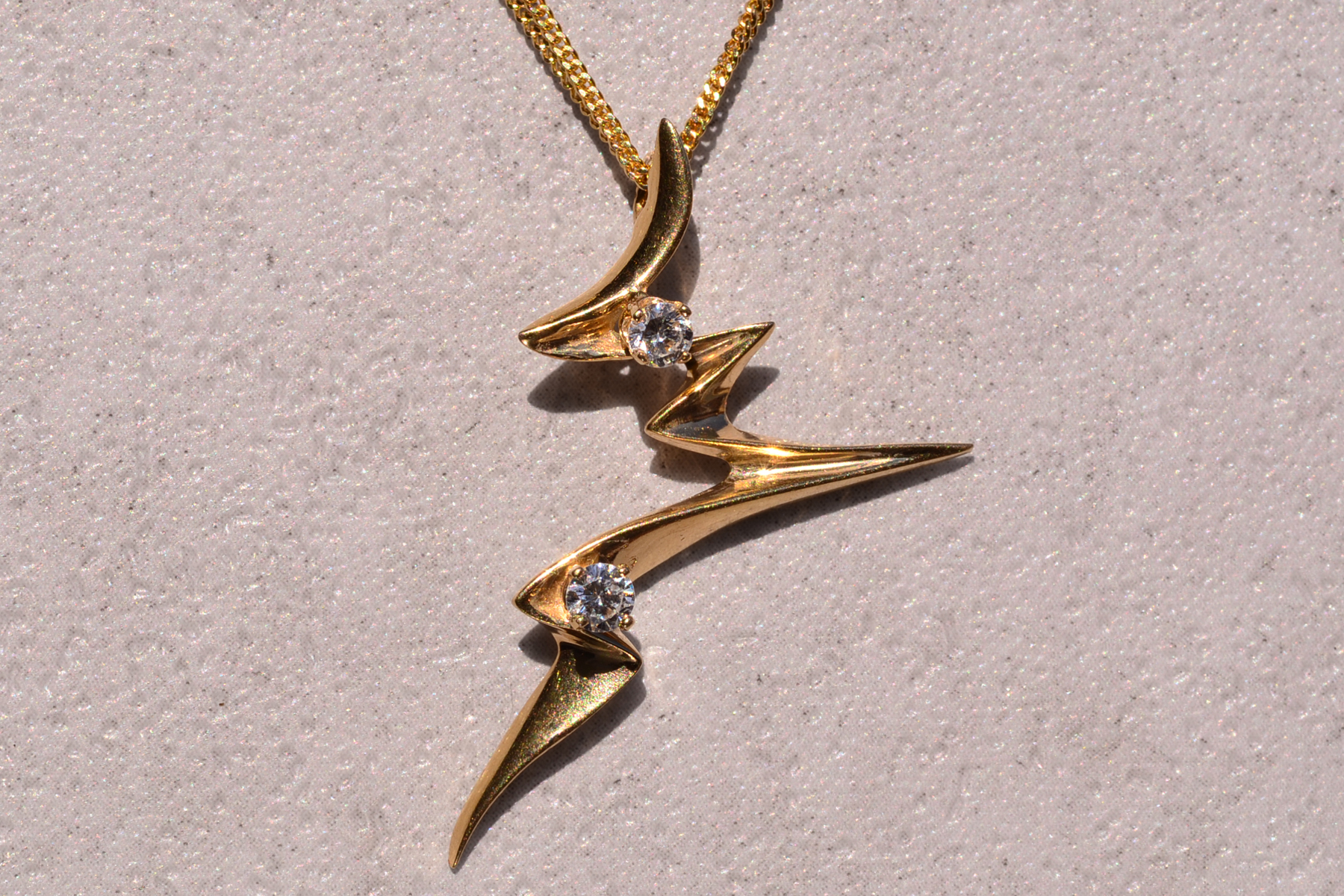 The 144th Street: Yellow Gold Lightning Pendant with Natural Diamonds - Image 2
