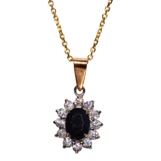 The 145th Street: Vintage Sapphire and White Sapphire Halo Pendant