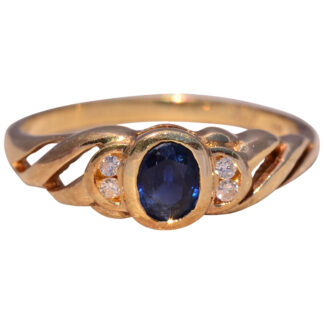 The Golden Twist: Sapphire and Diamond Ring in Yellow Gold