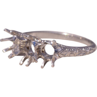 The Platinum Heirloom: Antique Platinum Three-Stone Mounting
