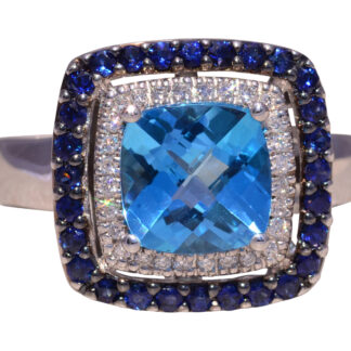 The Ocean Radiance: Blue Topaz, Natural Diamond, and Sapphire Ring in White Gold