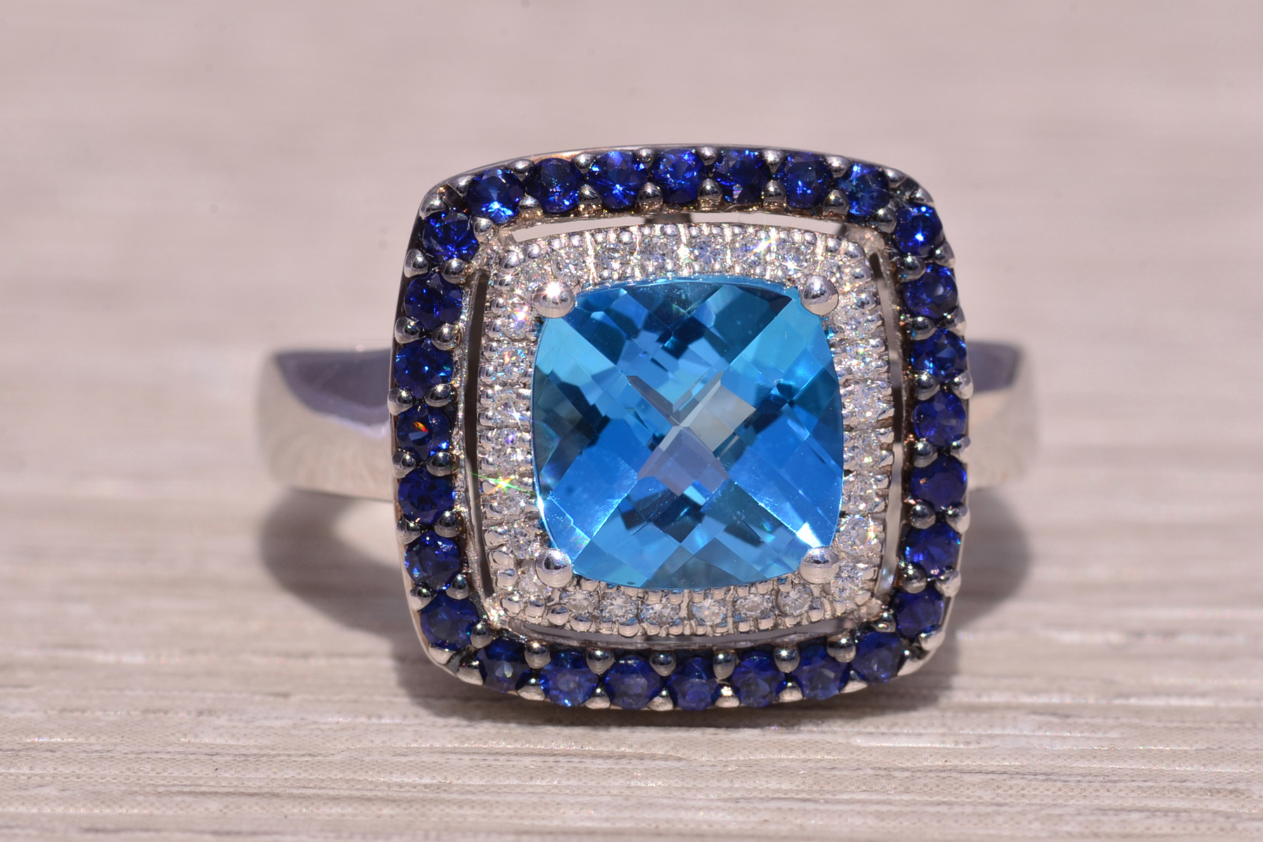 The Ocean Radiance: Blue Topaz, Natural Diamond, and Sapphire Ring in White Gold - Image 2