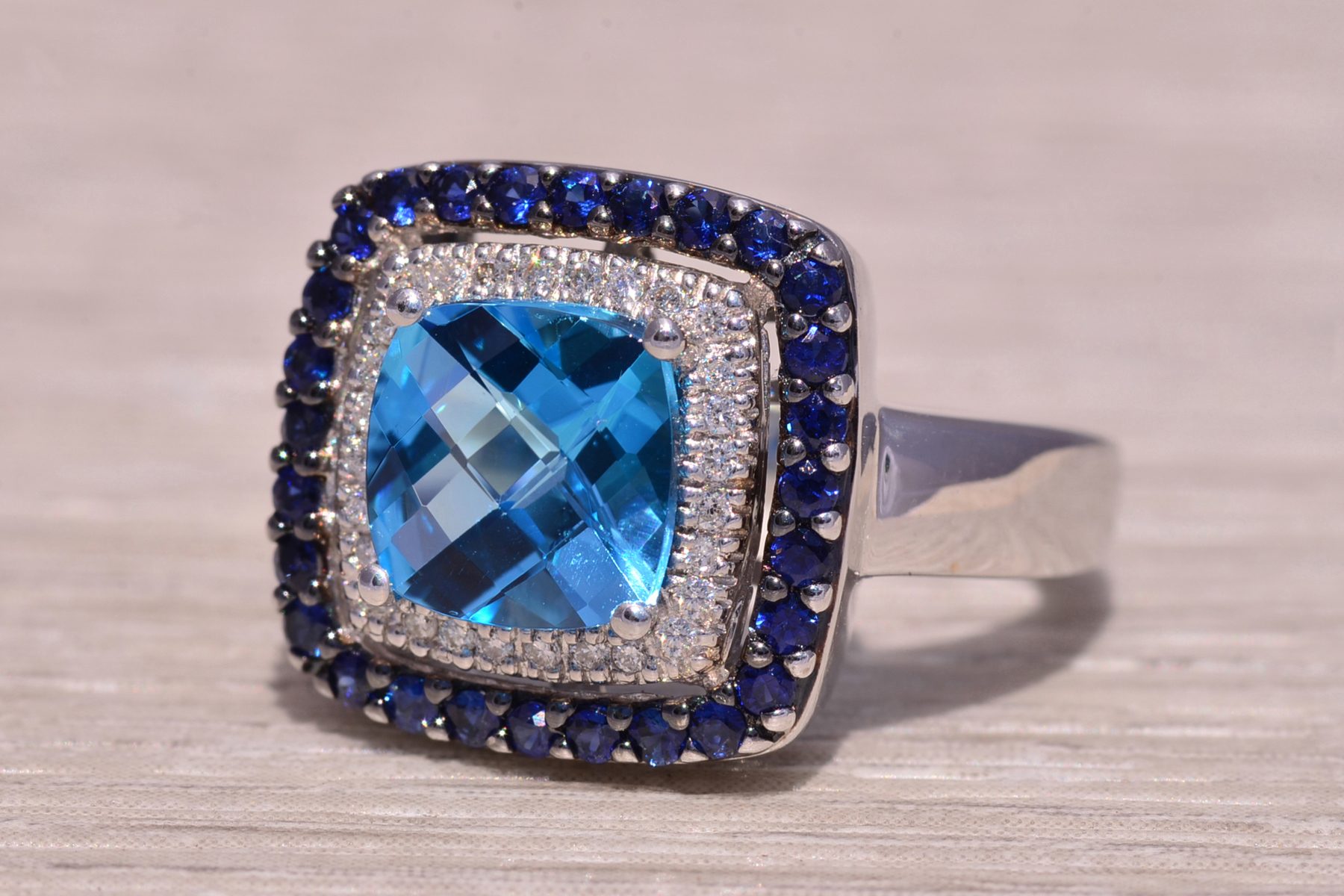 The Ocean Radiance: Blue Topaz, Natural Diamond, and Sapphire Ring in White Gold - Image 3