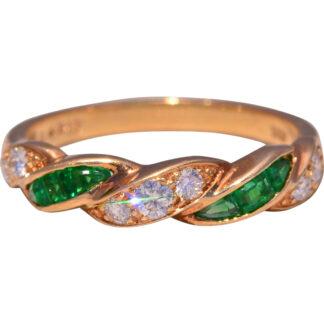 The Emerald Twist: Oscar Heyman Emerald and Diamond Ring in Yellow Gold