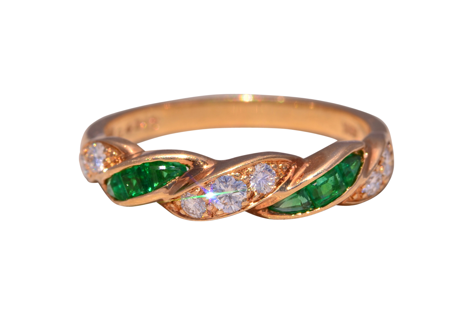 The Emerald Twist: Oscar Heyman Emerald and Diamond Ring in Yellow Gold