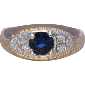 The Midnight Oval: Sapphire and Natural Diamond Ring in Two-Tone Gold