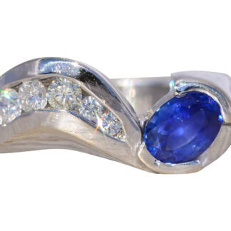 The Sapphire Sweep: Sapphire and Natural Diamond Ring in White Gold