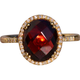SOLD - The 51st Avenue: Oval Checkerboard Cut Garnet and Diamond Halo Ring