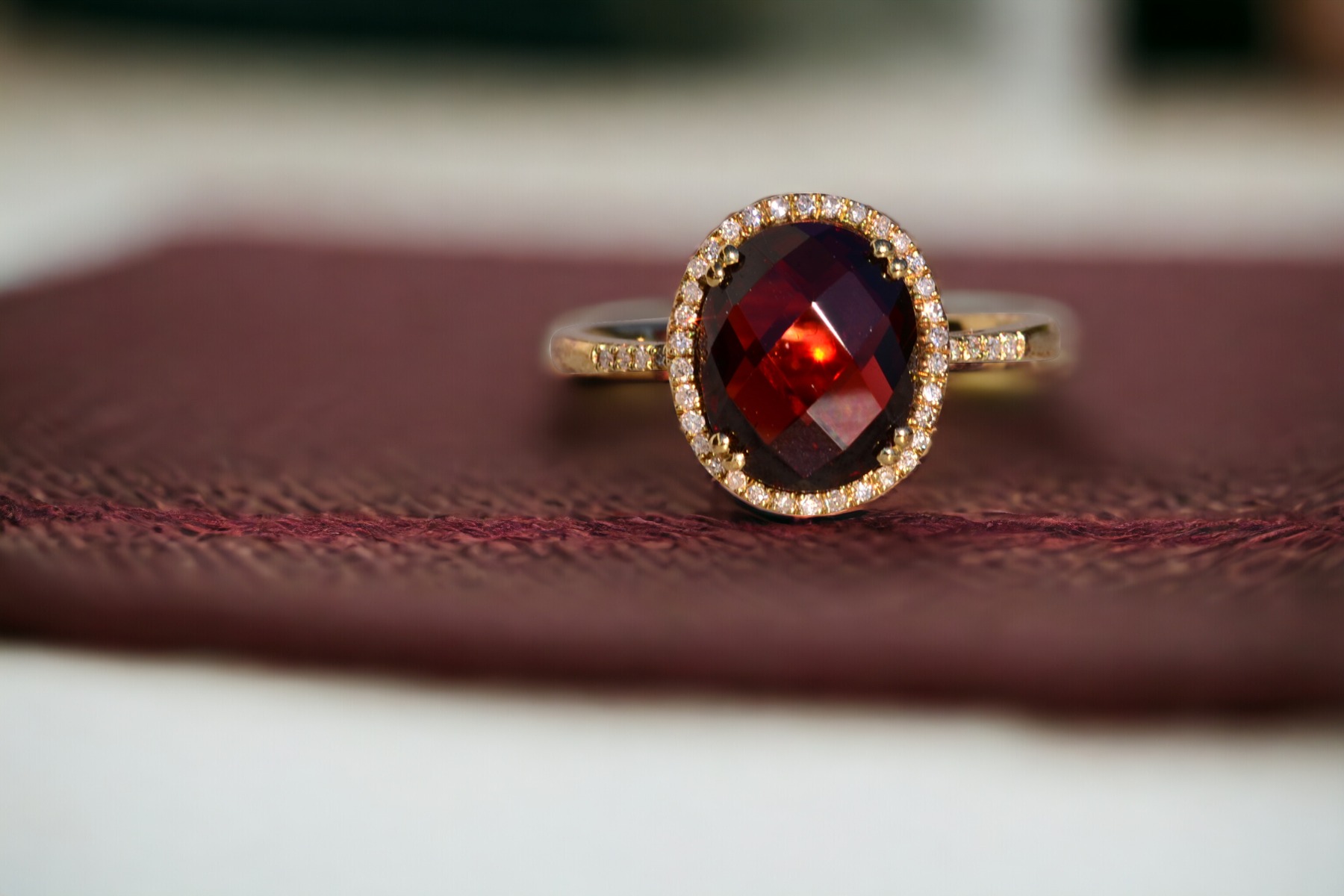 SOLD - The 51st Avenue: Oval Checkerboard Cut Garnet and Diamond Halo Ring - Image 11