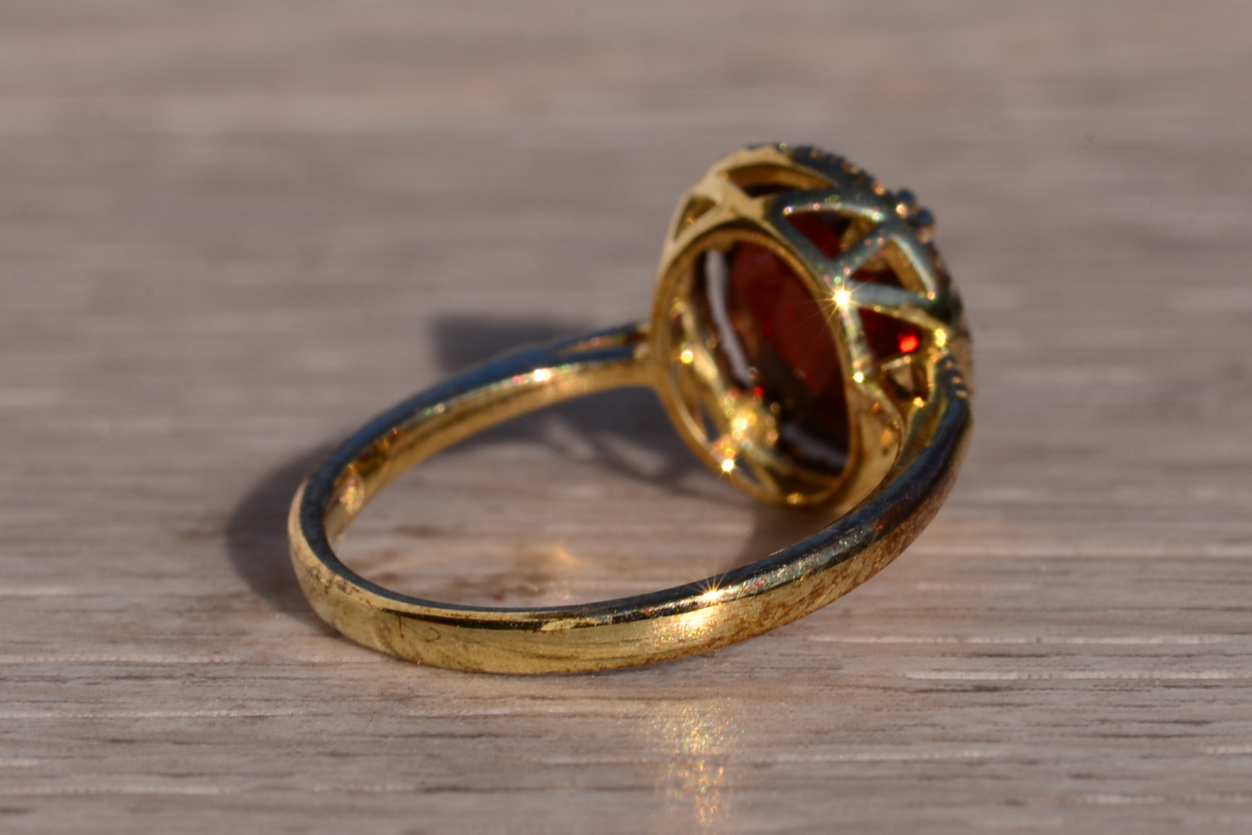 SOLD - The 51st Avenue: Oval Checkerboard Cut Garnet and Diamond Halo Ring - Image 5