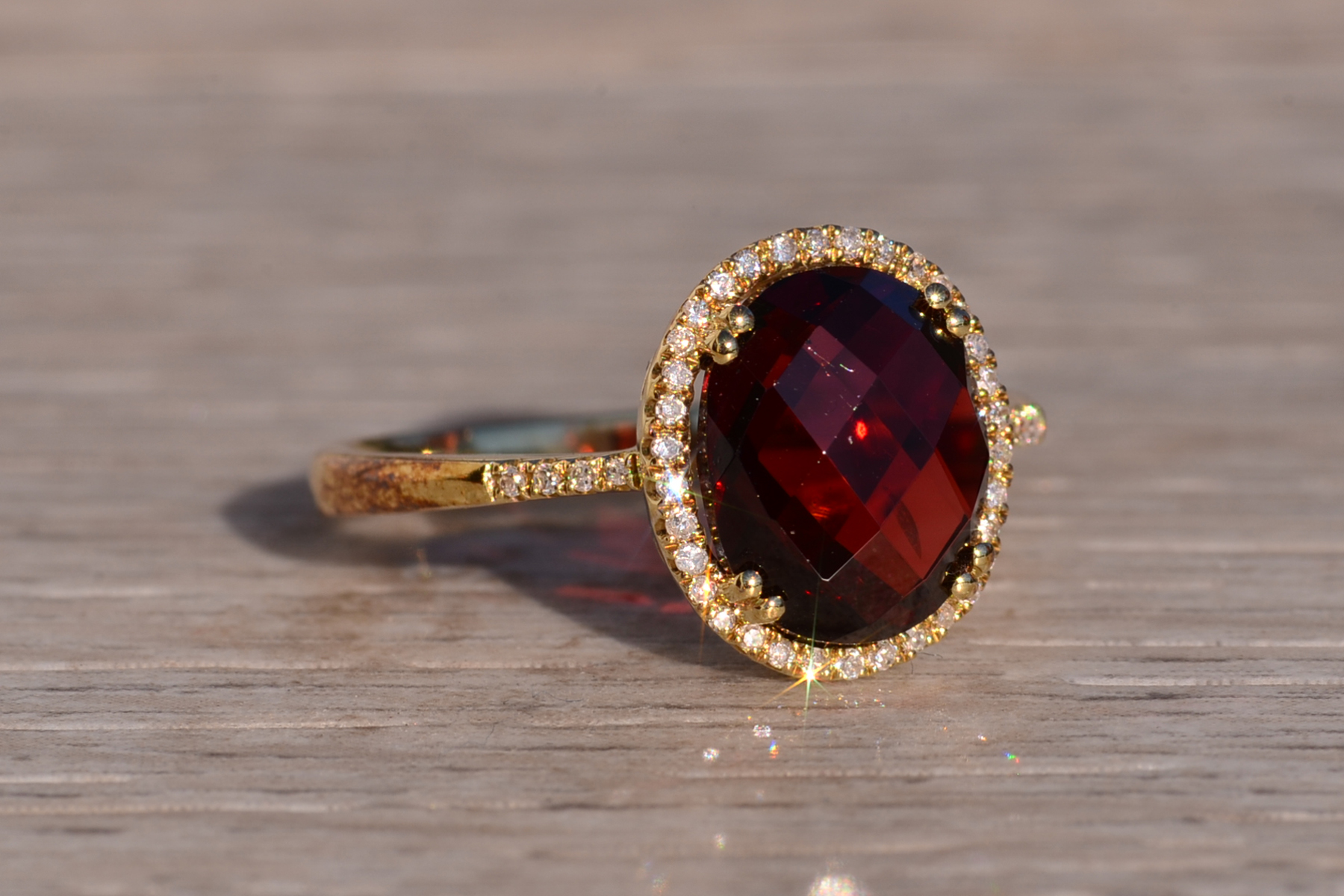 SOLD - The 51st Avenue: Oval Checkerboard Cut Garnet and Diamond Halo Ring - Image 6