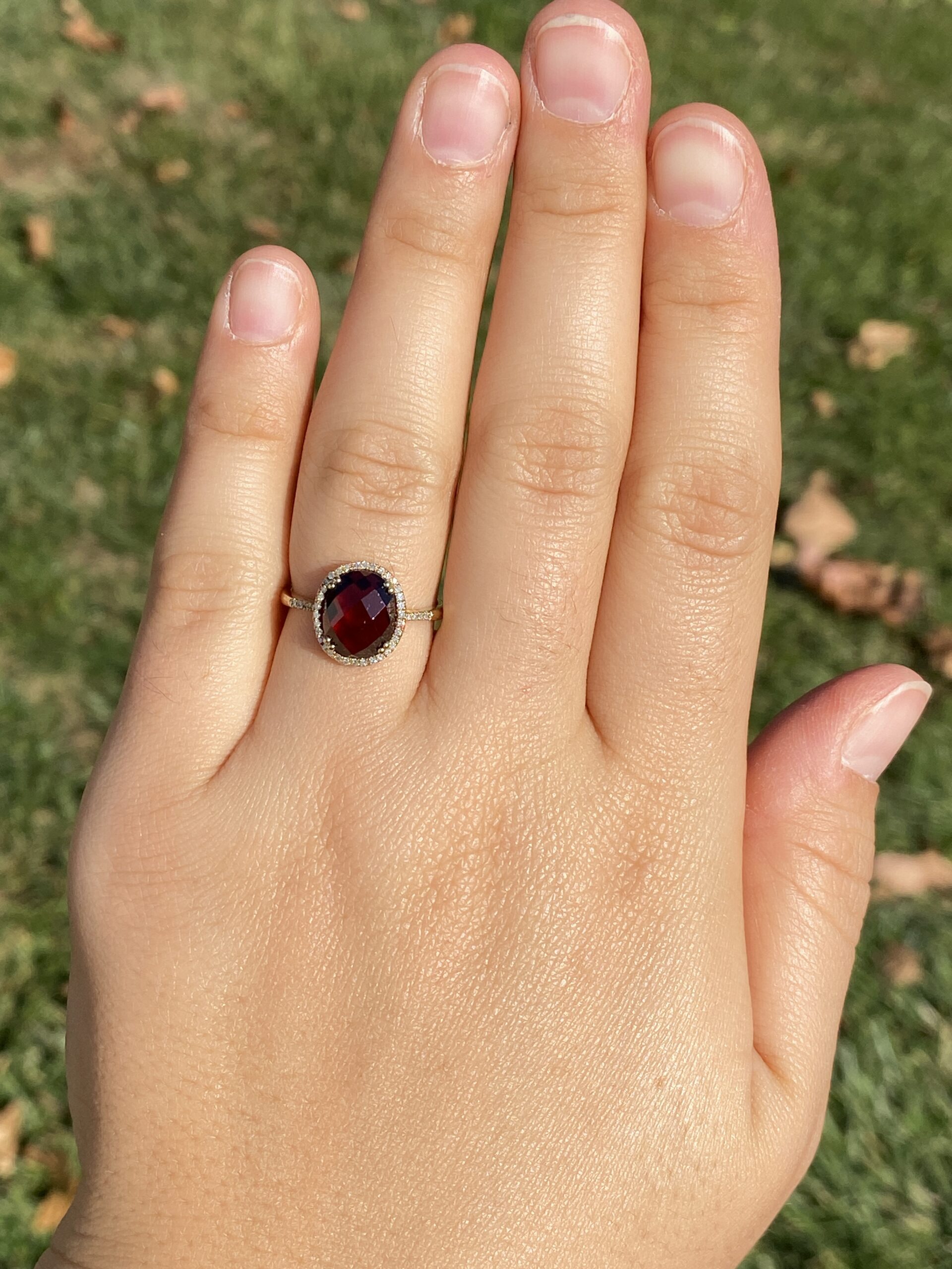 SOLD - The 51st Avenue: Oval Checkerboard Cut Garnet and Diamond Halo Ring - Image 8