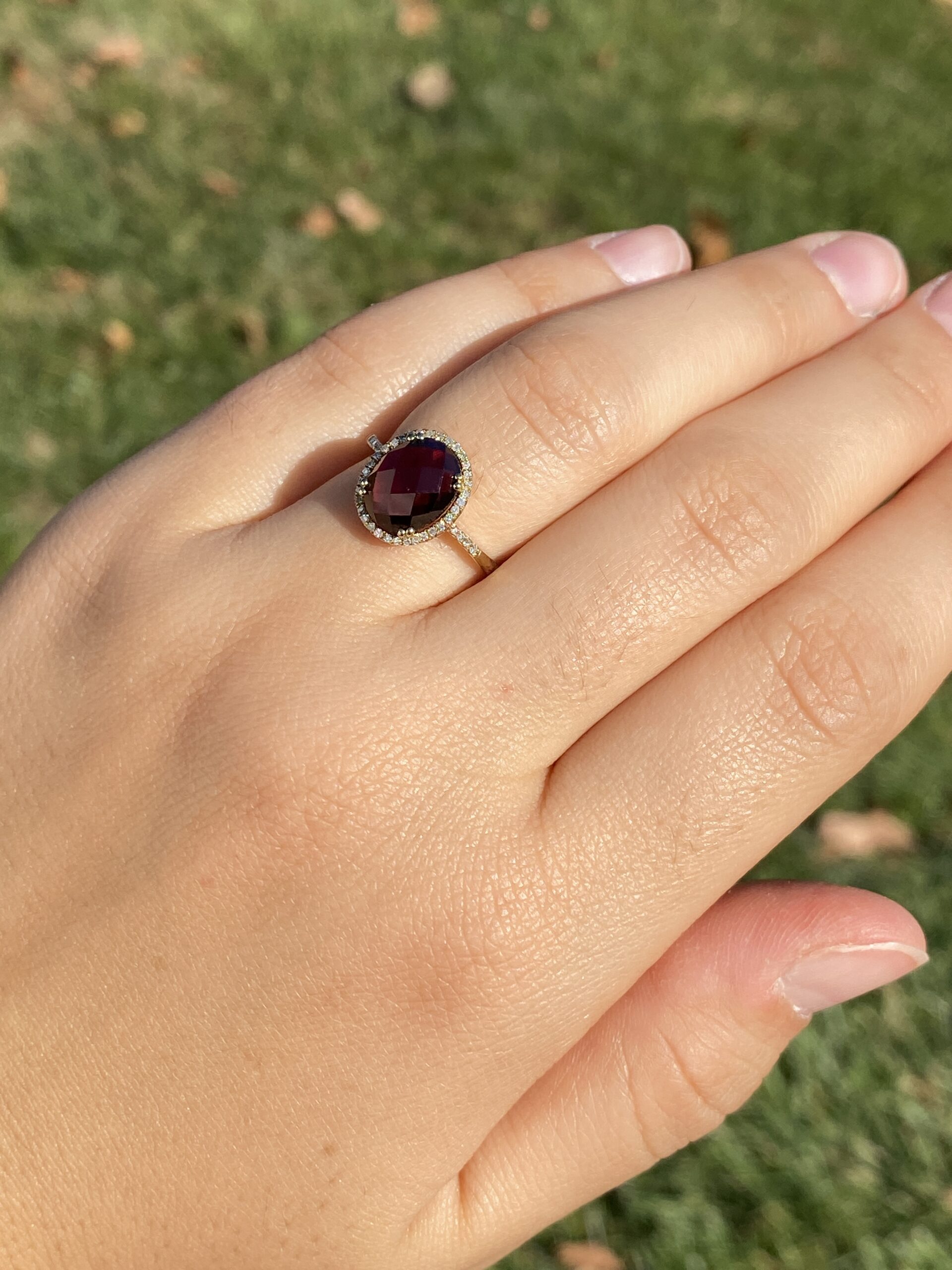 SOLD - The 51st Avenue: Oval Checkerboard Cut Garnet and Diamond Halo Ring - Image 10