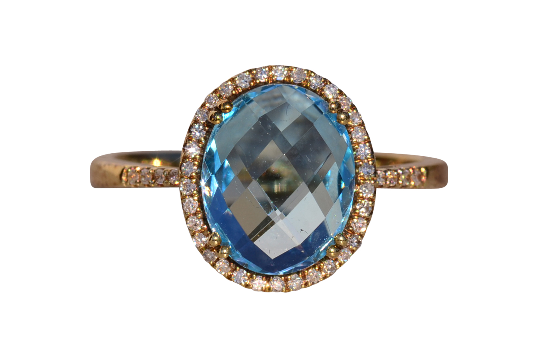 The 58th Avenue: Oval Checkerboard Cut Sky Blue Topaz and Diamond Halo Ring
