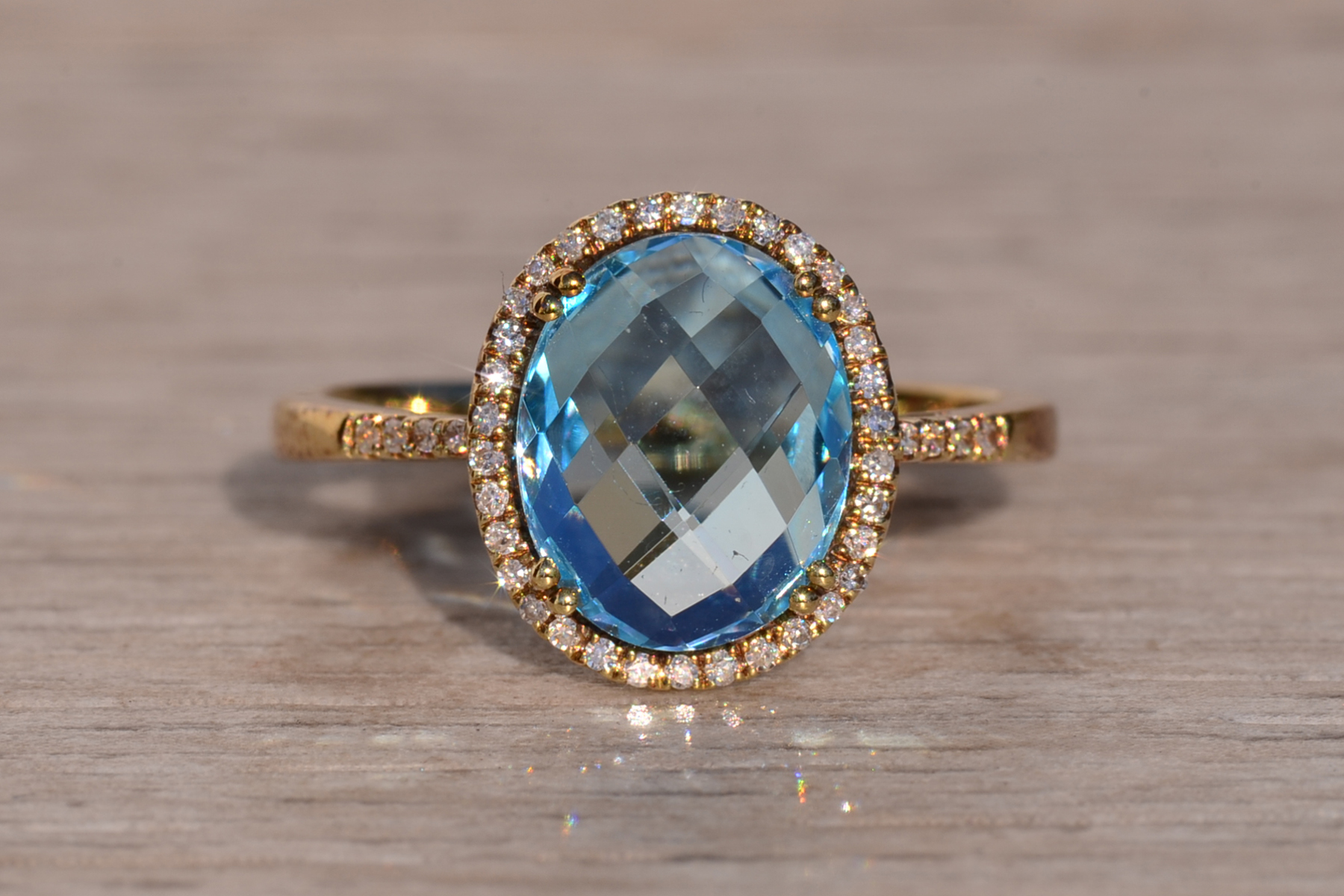 The 58th Avenue: Oval Checkerboard Cut Sky Blue Topaz and Diamond Halo Ring - Image 2