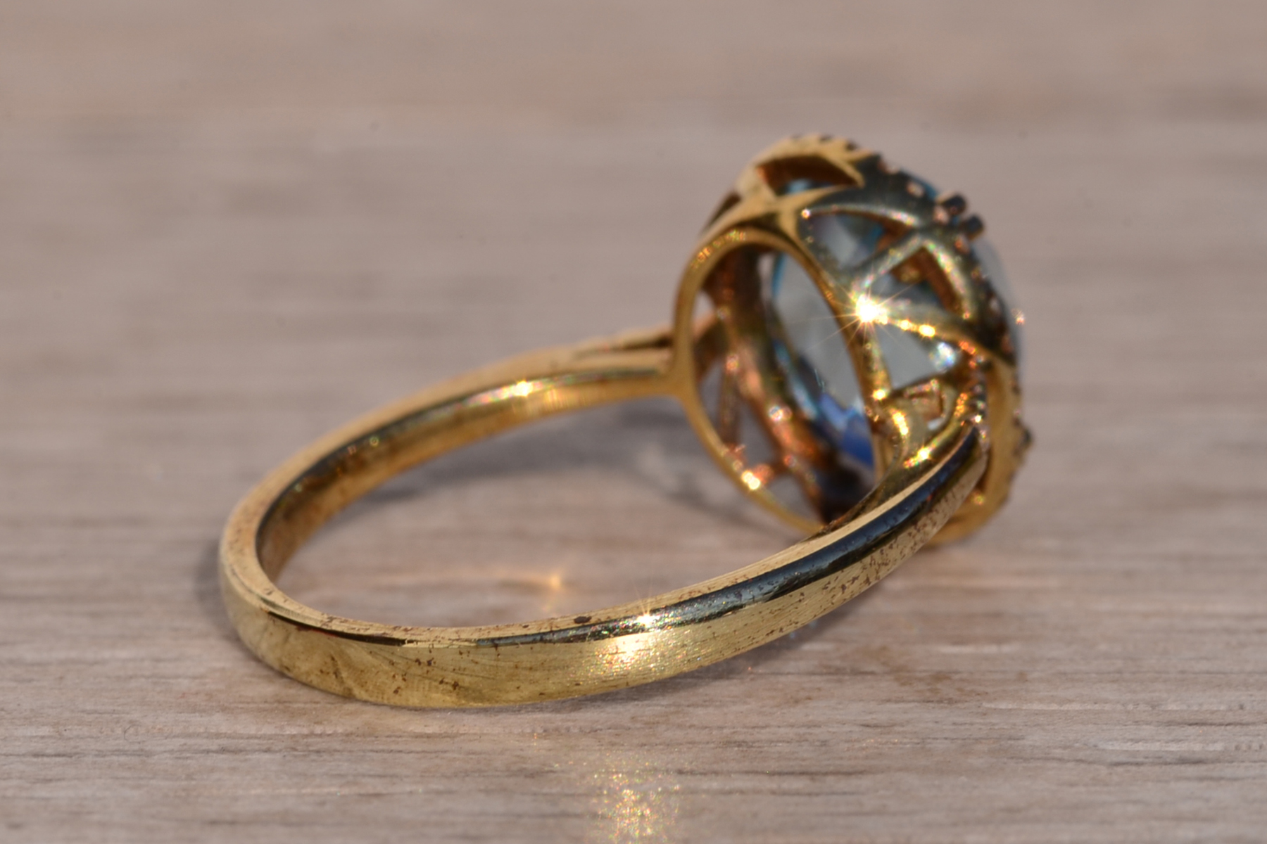 The 58th Avenue: Oval Checkerboard Cut Sky Blue Topaz and Diamond Halo Ring - Image 5