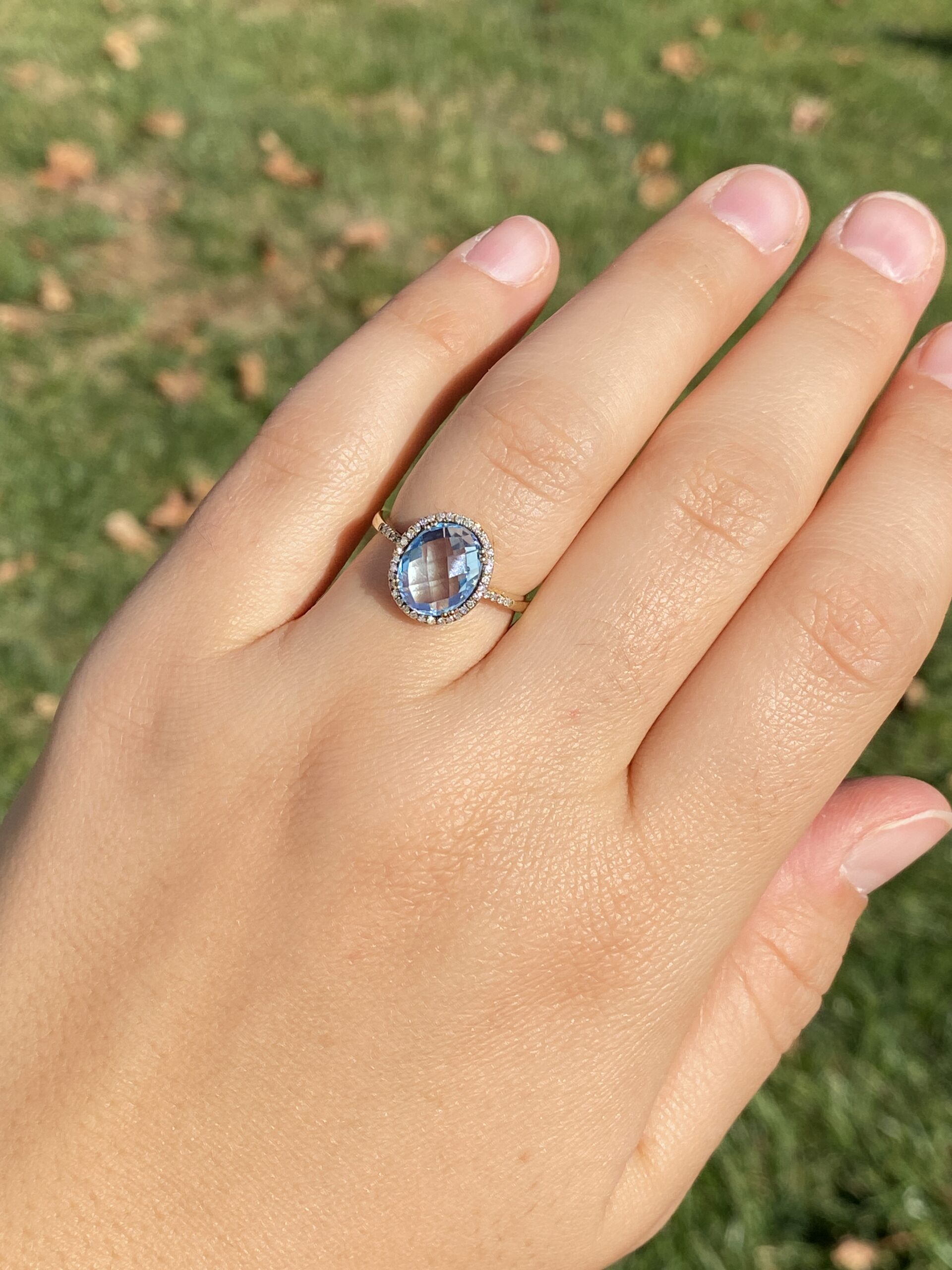 The 58th Avenue: Oval Checkerboard Cut Sky Blue Topaz and Diamond Halo Ring - Image 9