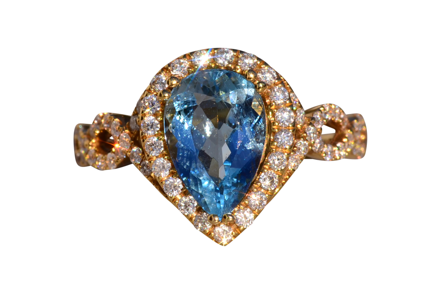 The 30th Avenue: Pear Shaped Aquamarine and Diamond Halo Ring in Yellow Gold