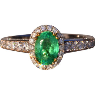 The 32nd Avenue: Natural Emerald and Diamond Halo Ring in White and Yellow Gold